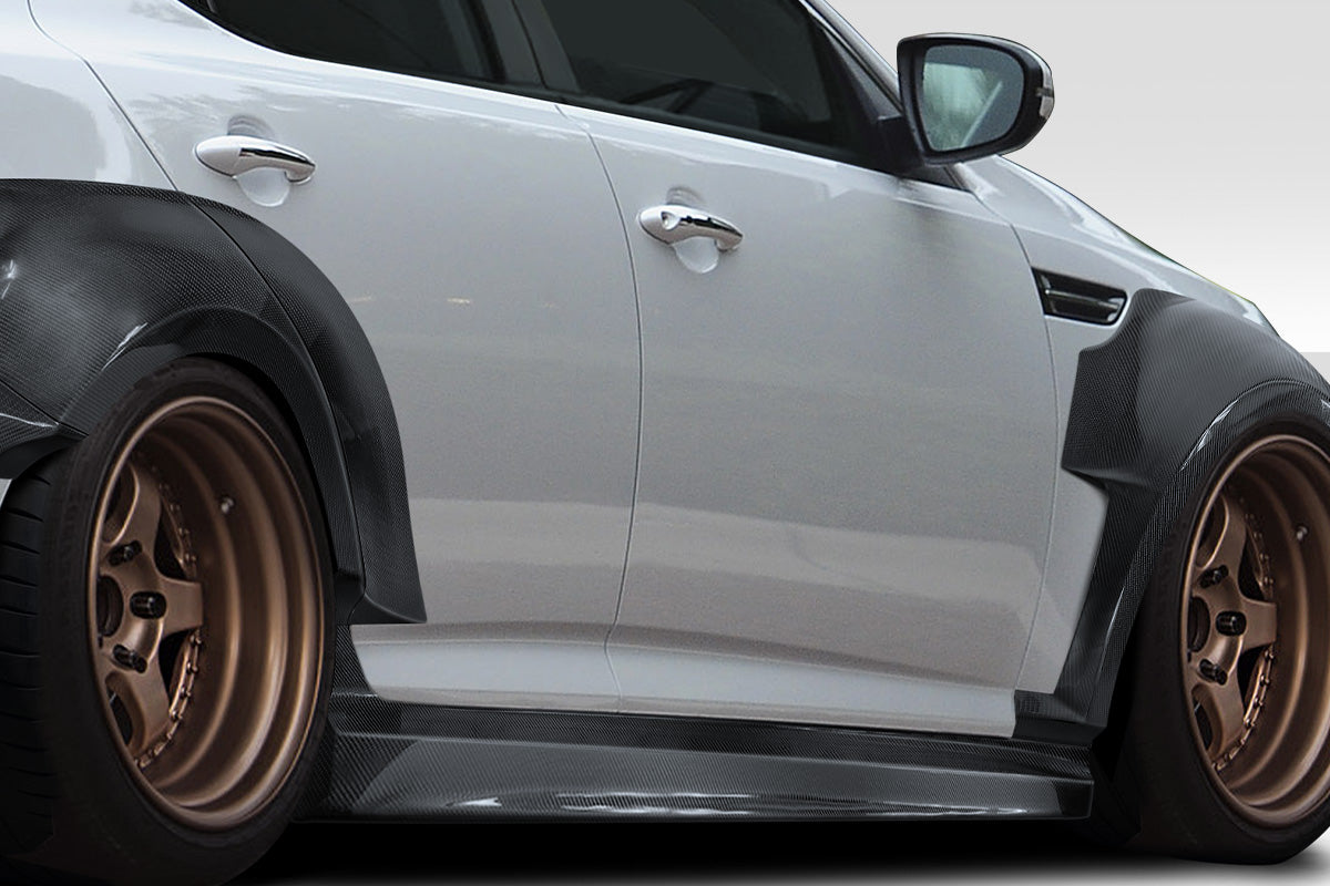 2011-2013 Kia Optima Carbon Creations CPR Body Kit - 14 Piece - Includes 116098 CPR Front Lip, 116247 CPR Side Skirts,, 116248 CPR Front Fender Flares, 116249 CPR Rear Fender Flares. 116246 CPR Rear Wing Spoiler (S)
