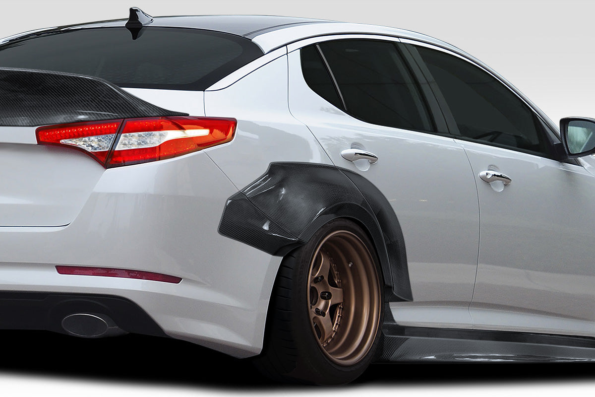 2011-2013 Kia Optima Carbon Creations CPR Body Kit - 14 Piece - Includes 116098 CPR Front Lip, 116247 CPR Side Skirts,, 116248 CPR Front Fender Flares, 116249 CPR Rear Fender Flares. 116246 CPR Rear Wing Spoiler (S)