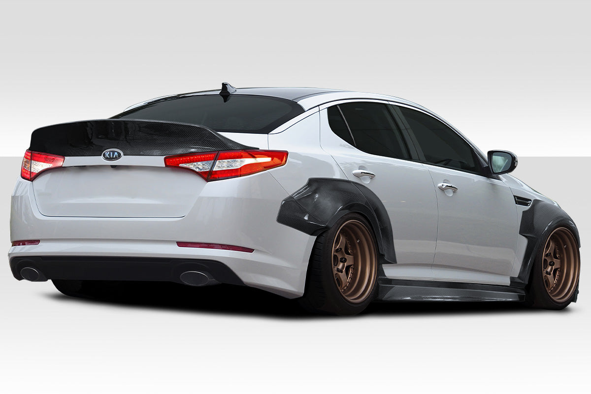 2011-2013 Kia Optima Carbon Creations CPR Body Kit - 14 Piece - Includes 116098 CPR Front Lip, 116247 CPR Side Skirts,, 116248 CPR Front Fender Flares, 116249 CPR Rear Fender Flares. 116246 CPR Rear Wing Spoiler (S)