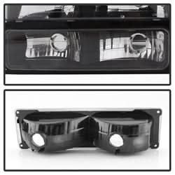 xTune Chevrolet C1500 Pickup/C1500 Suburban/C2500 Pickup/C2500 Suburban/C3500 Pickup/K1500 Pickup/K1500 Suburban/K2500 Pickup/K2500 Suburban/K3500 Pickup/Tahoe 94-98 w/Corner And Parking Lights XTune Headlights 8 pc. Set Black
