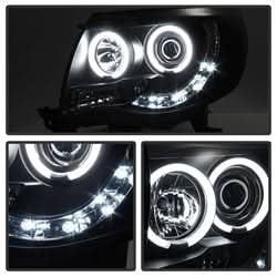 Spyder Signature Toyota Tacoma 05-11 Replaceable LEDs CCFL Halo LED Projector Headlights High H1/Low H1 Included Black Smoke