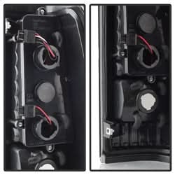 xTune Chevy Silverado 1500/2500/3500 99-02 / GMC Sierra 1500/2500/3500 99-06 and 2007 Sierra Classic Version 2 LED Tail Lights - Black Smoke