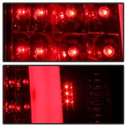xTune Chevy Silverado 1500/2500/3500 99-02 / GMC Sierra 1500/2500/3500 99-06 and 2007 Sierra Classic Version 3 Tail Lights - Light Bar LED - Red Clear