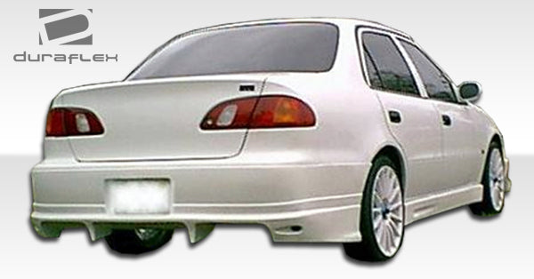 1998-2002 Toyota Corolla Bomber Style Rear Bumper Cover - FRP