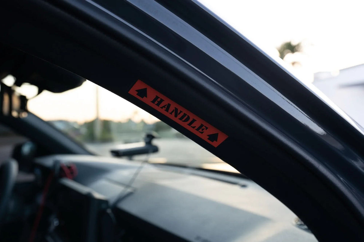 Passenger Side Grab Handle Warning Label - 2024+ Tacoma / 2025+ 4Runner
