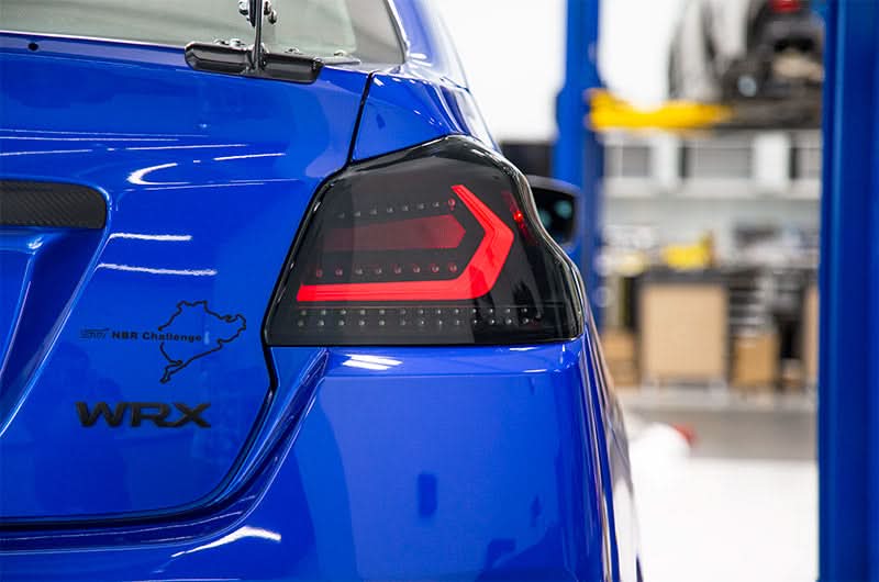 OLM Evolution Tail Lights Smoked Lens Black Base White Bar 15+ WRX STI