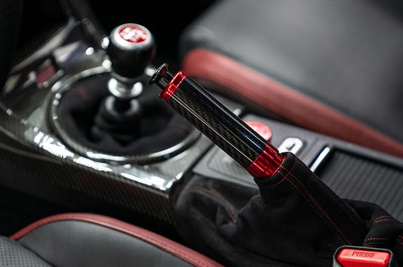 OLM Signature Series Ebrake Handle (Black Carbon w/Red) - 2015-2021 WRX & STI / 2013-2022 FR-S / BRZ / 86 / 2014-2018 Forester / 2013+ *Crosstrek