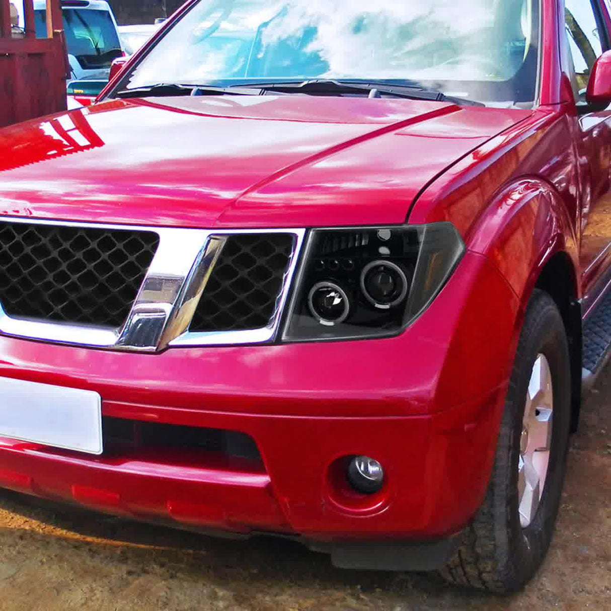 Spec-D Projector Headlights Nissan Frontier (05-08) Pathfinder (05-07) Dual LED Halo - Black or Chrome