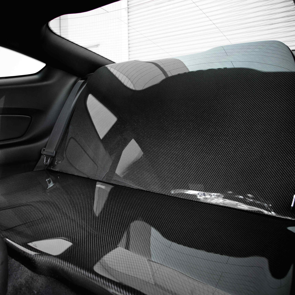 Carbon fiber rear seat delete for 2015-2023 Ford Mustang