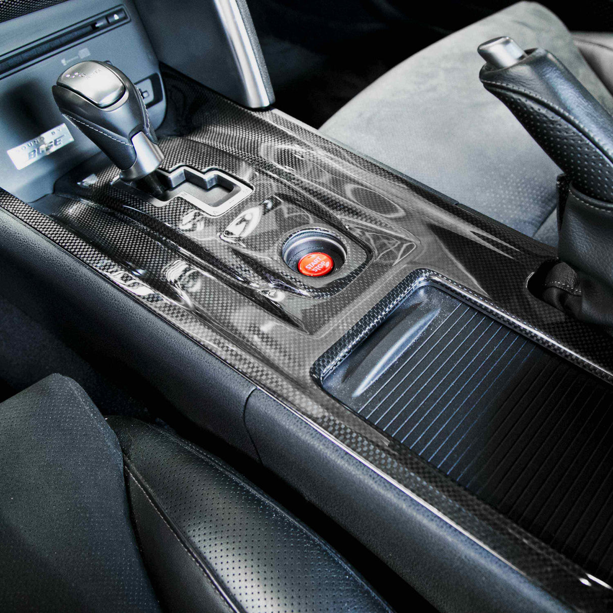 Carbon fiber center shifter bezel for 2009-2016 Nissan GTR.