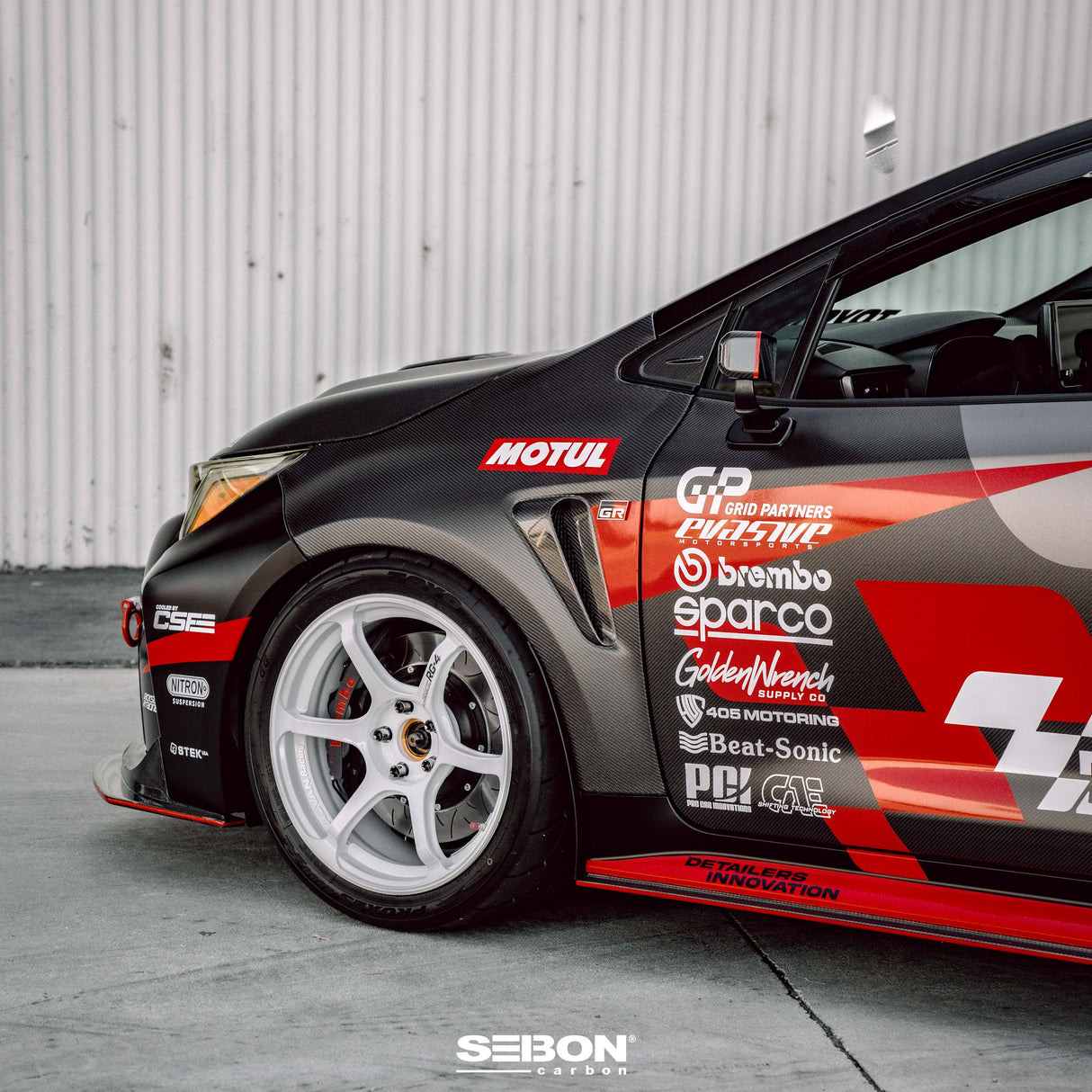 OE-style dry carbon fiber fenders for 2023-2024 Toyota GR Corolla - Gloss finish