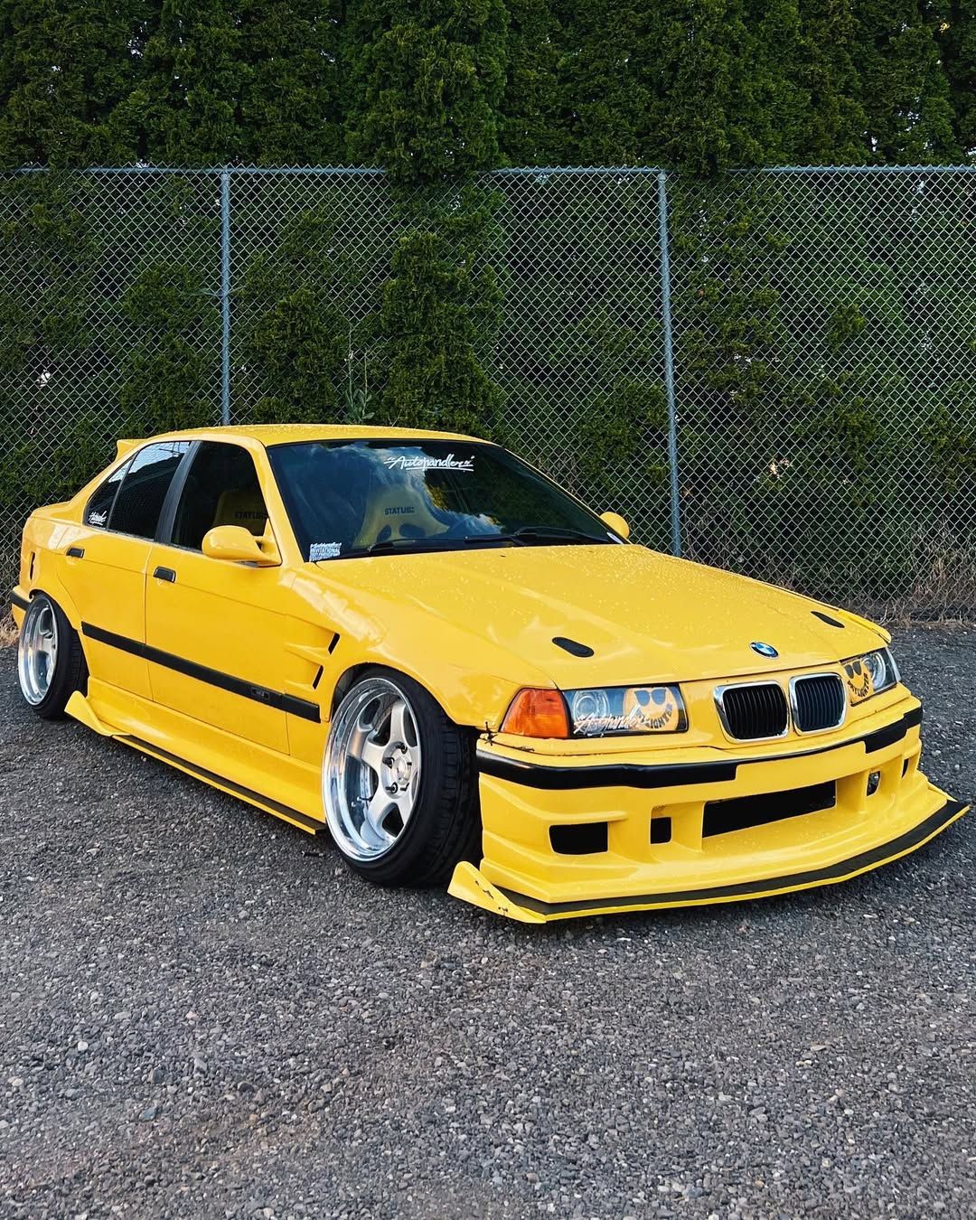 Yellow BMW E36 with Autohandler Aero widebody kit and front lip