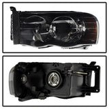 xTune Dodge Ram 1500/Ram 2500/Ram 3500 02-05 Amber/Black Smoke XTune Crystal Headlights