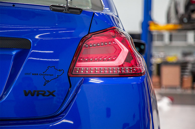 OLM Evolution Tail Lights Clear Lens Red Base White Bar 15+ WRX STI