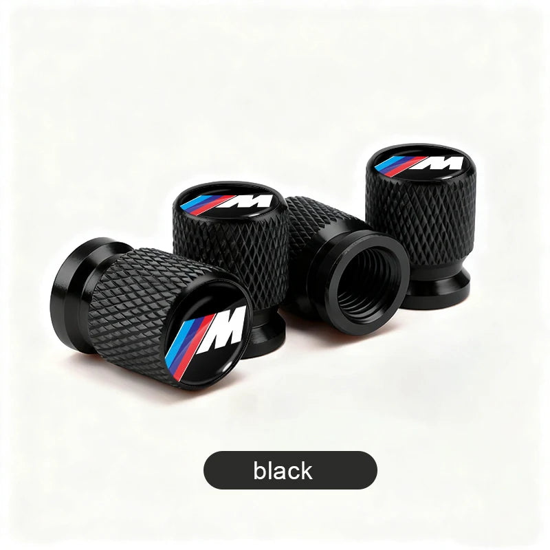 BMW Anodized Aluminum Tire Valve Stem Caps 4-Piece Set with Rubber O-Ring Seals (Universal Fit / E34 / E36 / E39 / E46 / E60 / E70 / E90 / F10 / F20 / F30 / X1 / X5 / X6 / M3 / M5 / M6)