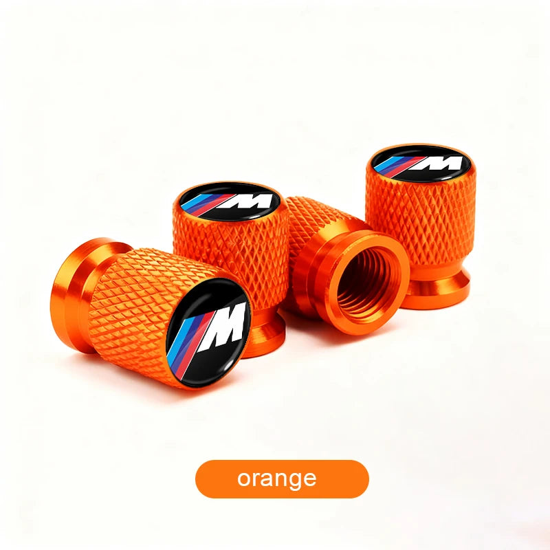 BMW Anodized Aluminum Tire Valve Stem Caps 4-Piece Set with Rubber O-Ring Seals (Universal Fit / E34 / E36 / E39 / E46 / E60 / E70 / E90 / F10 / F20 / F30 / X1 / X5 / X6 / M3 / M5 / M6)