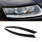 Audi A6 C6 Headlight Eyebrow Trim – Piano Black Eyelid Covers (2004–2009)