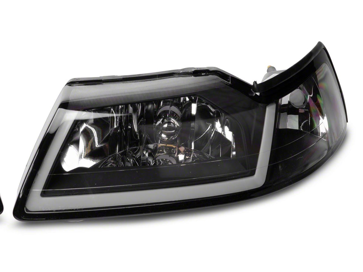 Raxiom Axial Series Headlights With Led Bar; Black Housing; Clear Lens (99-04 Mustang)