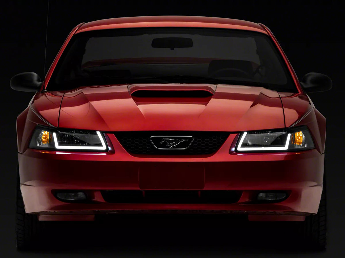 Raxiom Axial Series Headlights With Led Bar; Black Housing; Clear Lens (99-04 Mustang)