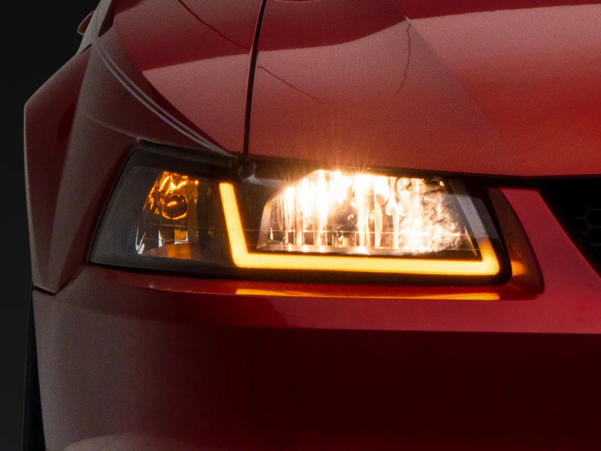 Raxiom Axial Series Headlights With Sequential Led Bar; Black Housing; Clear Lens (99-04 Mustang)