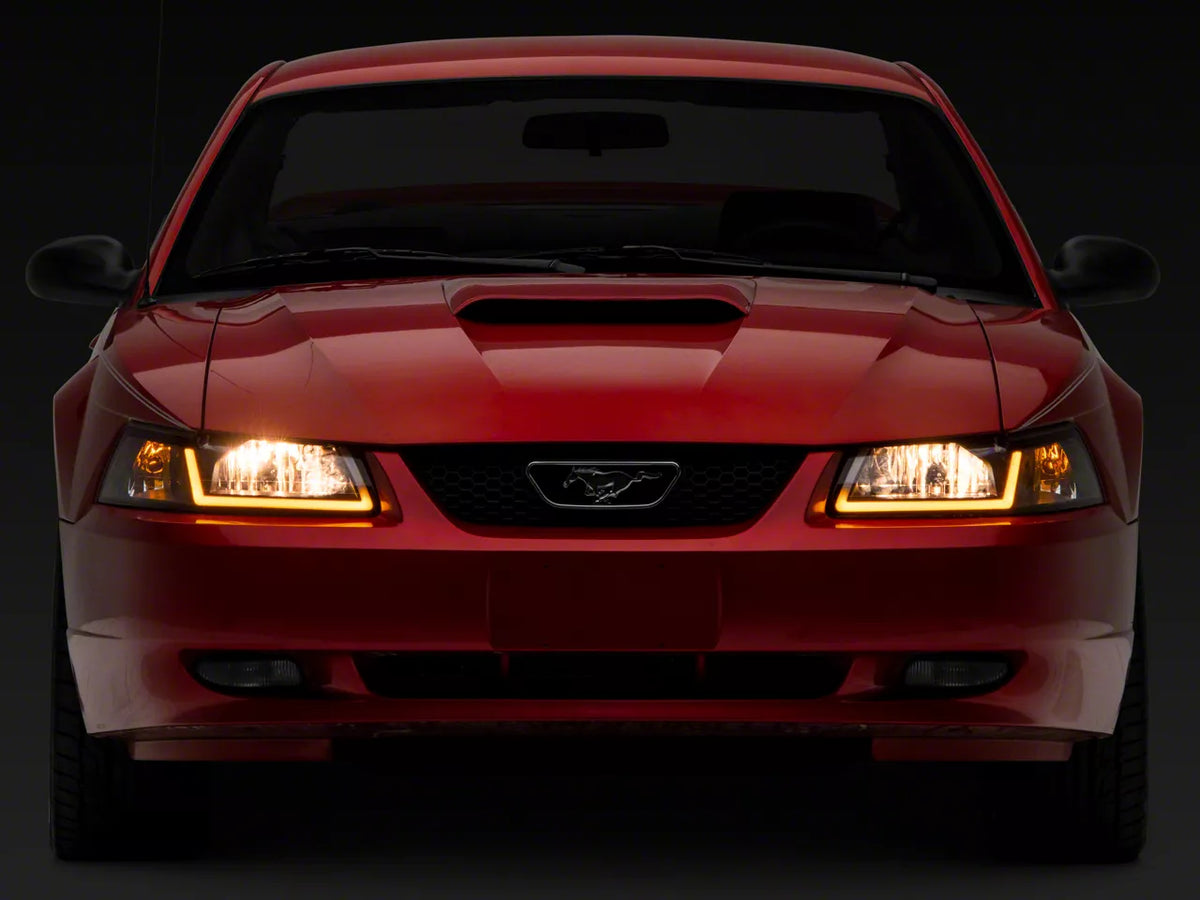 Raxiom Axial Series Headlights With Sequential Led Bar; Black Housing; Clear Lens (99-04 Mustang)