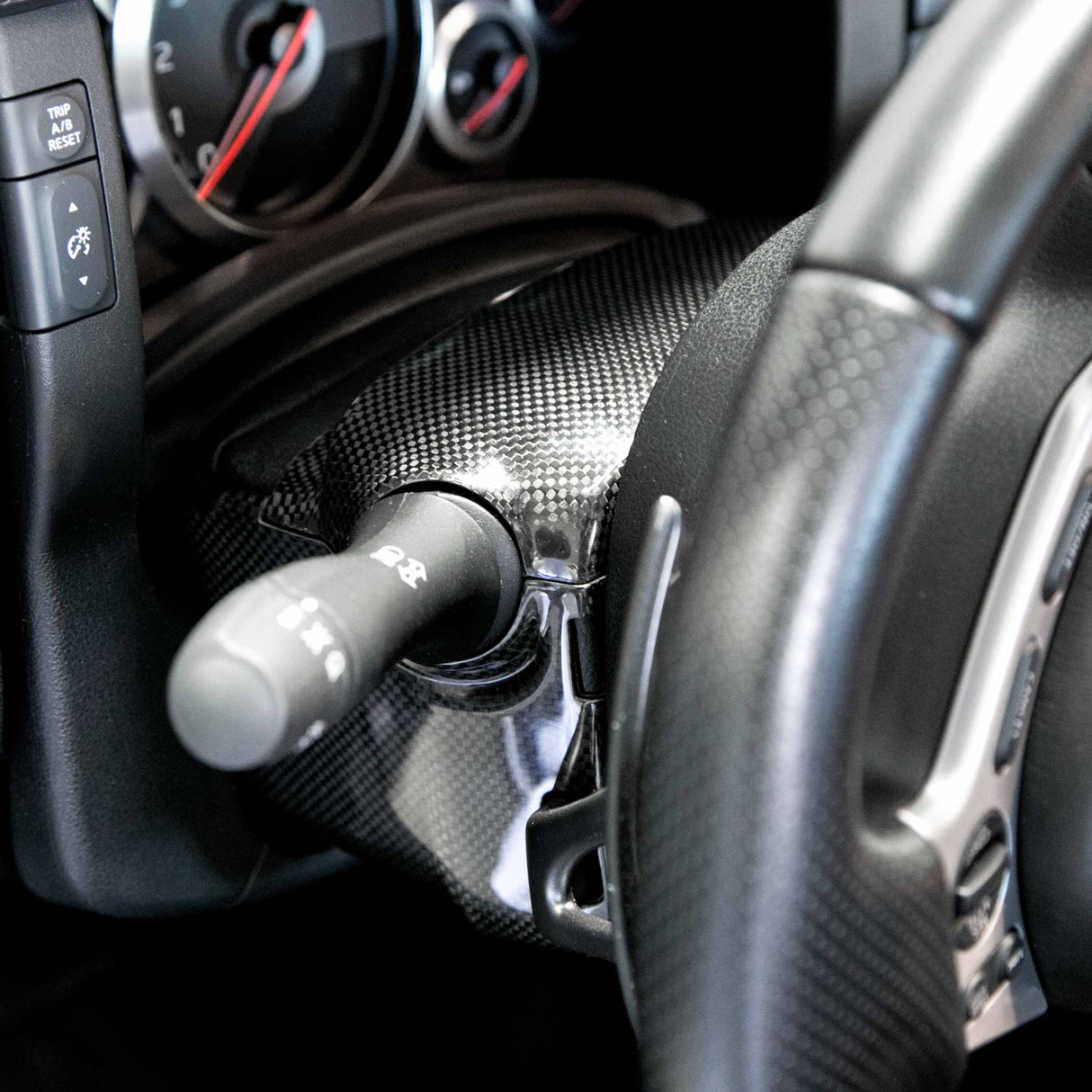 Carbon fiber steering column surround trim (4 pcs) for 2009-2016 Nissan GTR