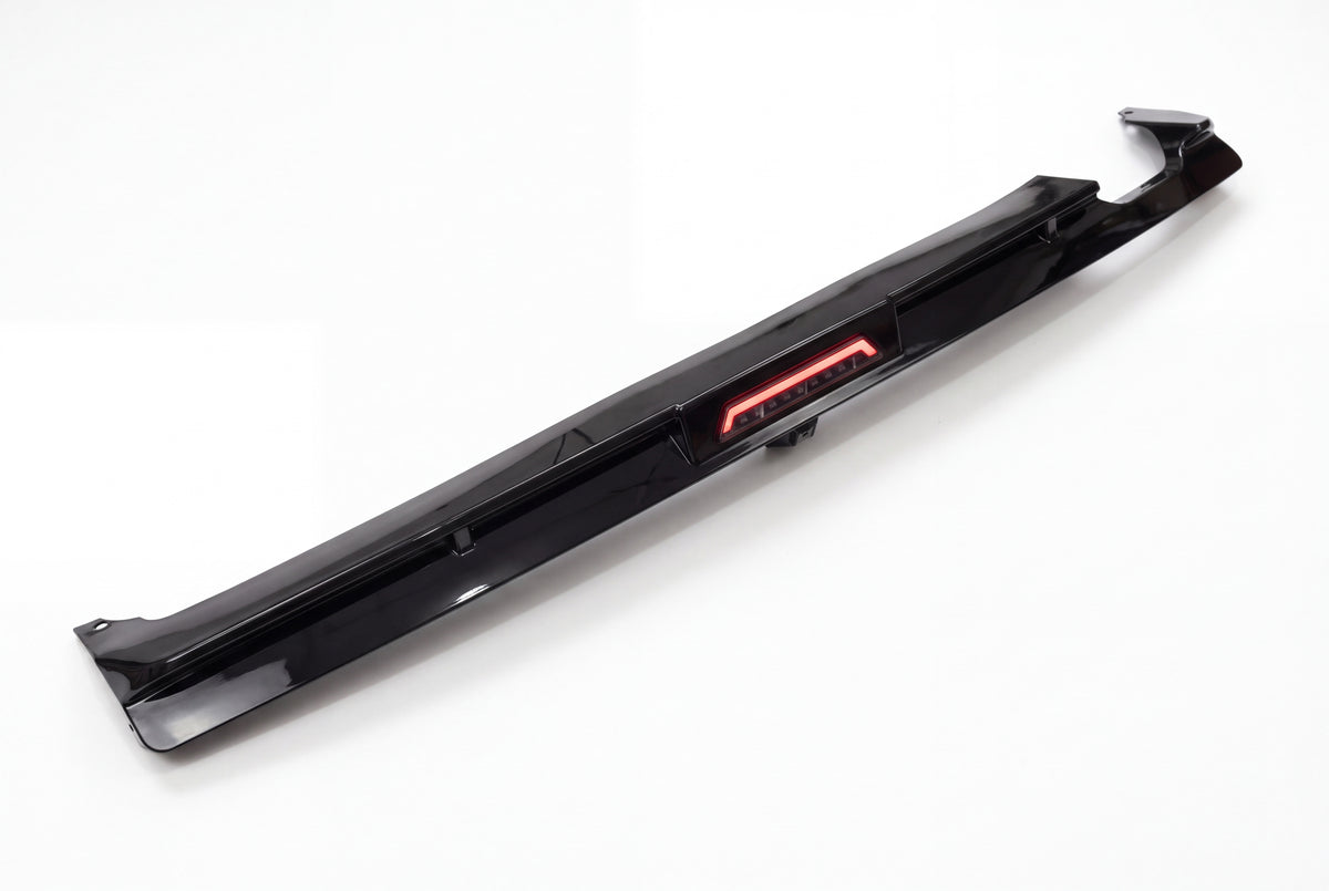 BMW E36 M3 M Sport gloss black diffuser with red LED module on white