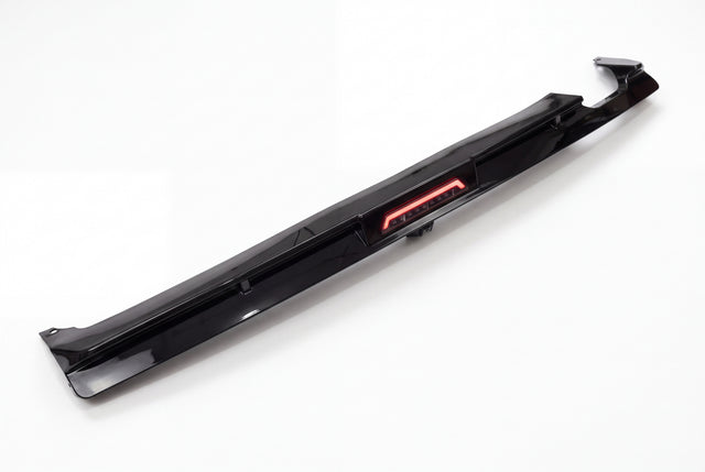 BMW E36 M3 M Sport gloss black diffuser with red LED module on white