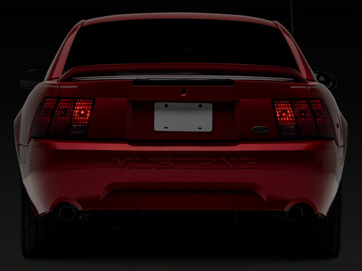 OPR Tail Light; Chrome Housing; Red/Clear Lens; Driver Side (99-04 Mustang, Excluding 99-01 Cobra)