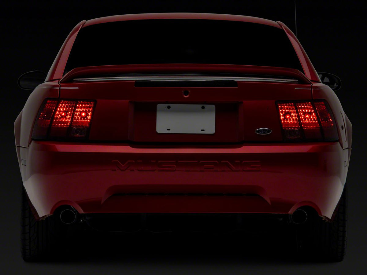 OPR Tail Light; Chrome Housing; Red/Clear Lens; Driver Side (99-04 Mustang, Excluding 99-01 Cobra)