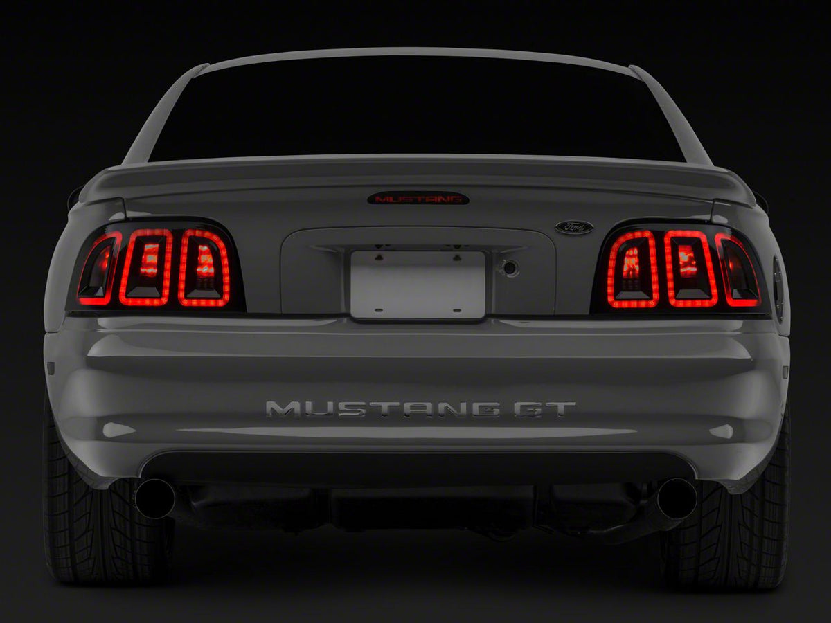 Raxiom Icon Led Tail Lights; Black Housing; Smoked Lens (96-98 Mustang)