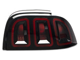 Raxiom Icon Led Tail Lights; Black Housing; Smoked Lens (96-98 Mustang)