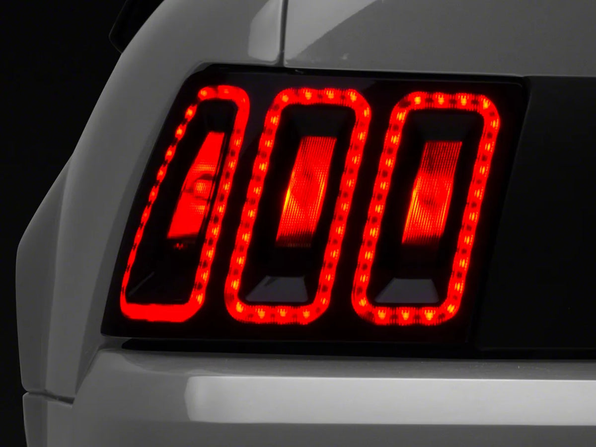 Raxiom Icon Led Tail Lights; Black Housing; Smoked Lens (99-04 Mustang, Excluding 99-01 Cobra)