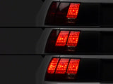 Raxiom Tail Lights And Sequential Tail Light Kit; Black Housing; Smoked Lens (99-04 Mustang, Excluding 99-01 Cobra)