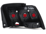 Raxiom Tail Lights And Sequential Tail Light Kit; Black Housing; Smoked Lens (99-04 Mustang, Excluding 99-01 Cobra)